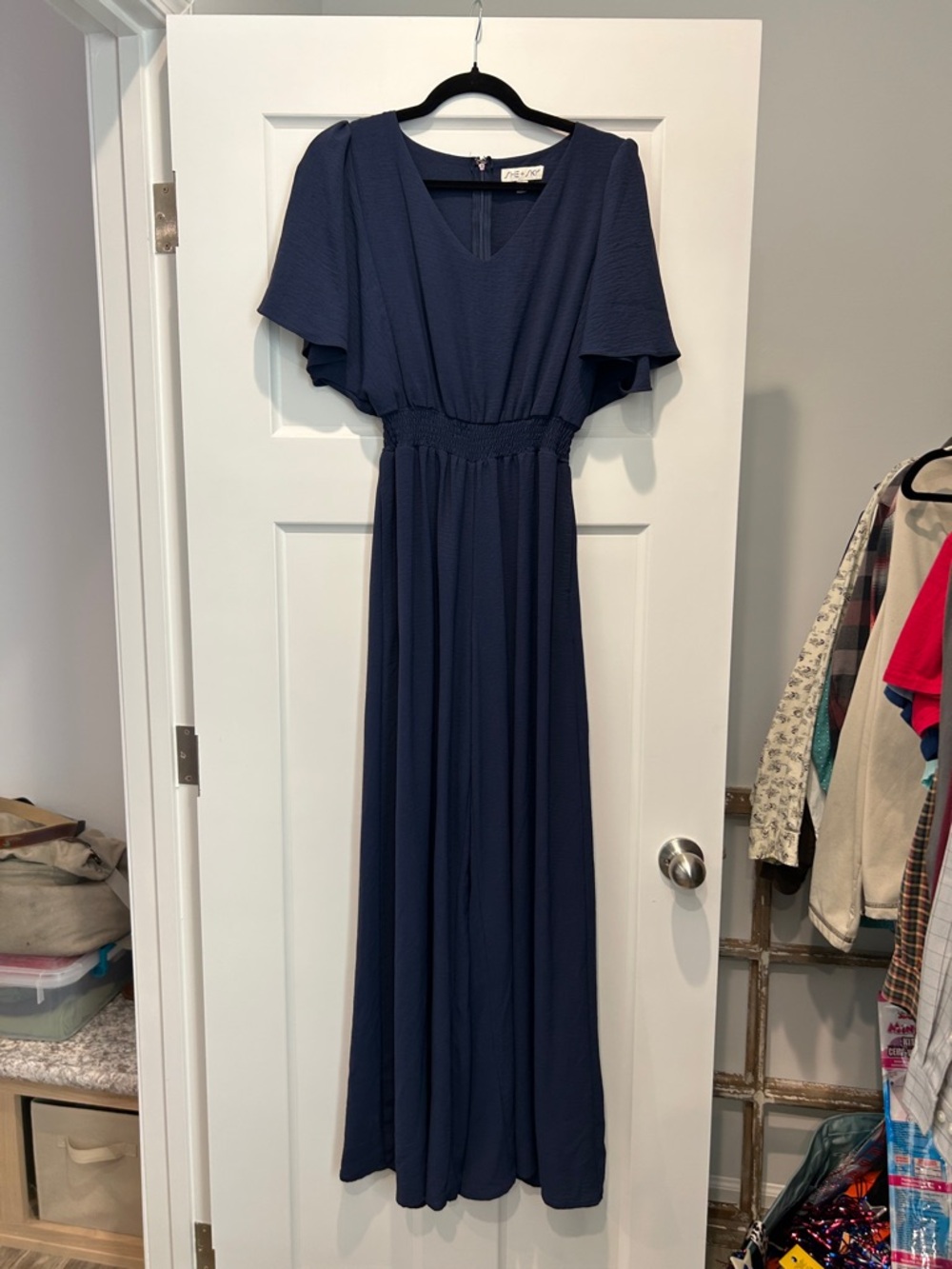 Women’s Navy V‑Neck Jumpsuit with Flutter Sleeves